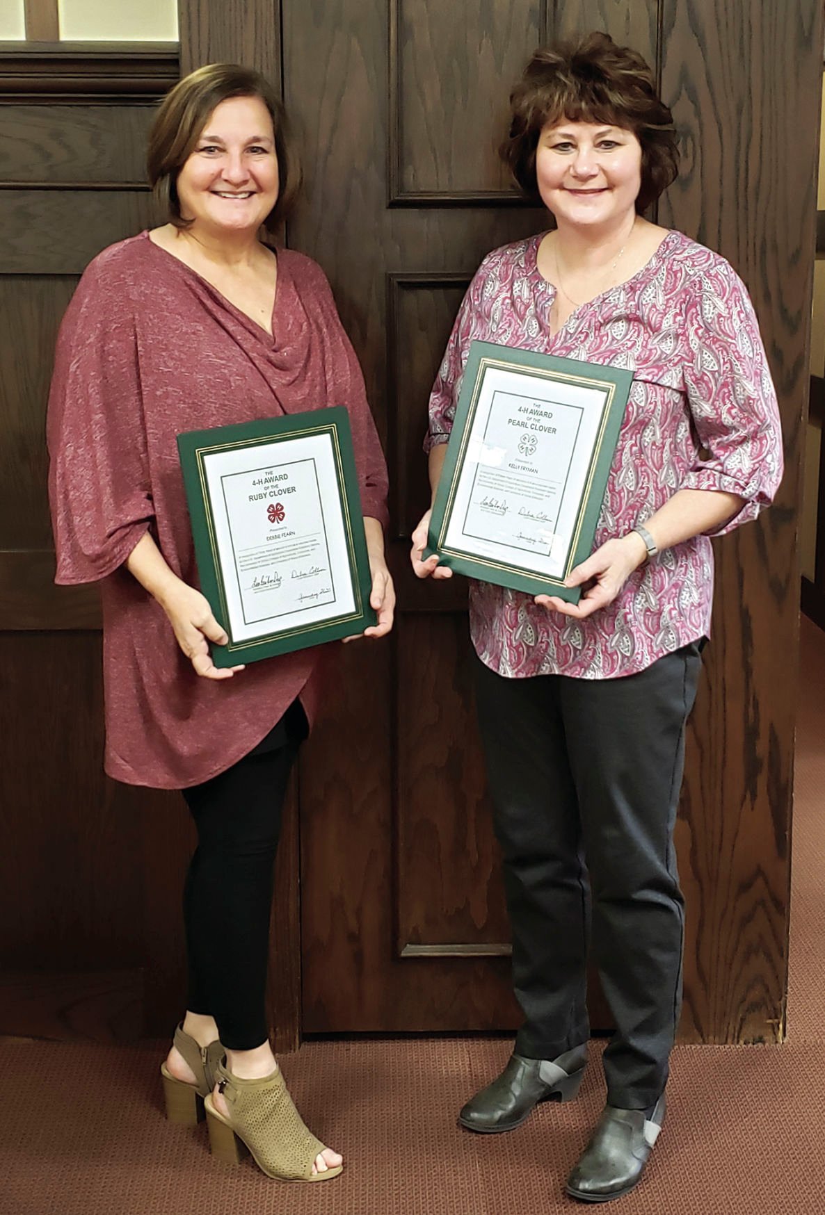 Debbie and Neil Fearn, Kelly and Wes Fryman recognized by EC 4-H  for years of service